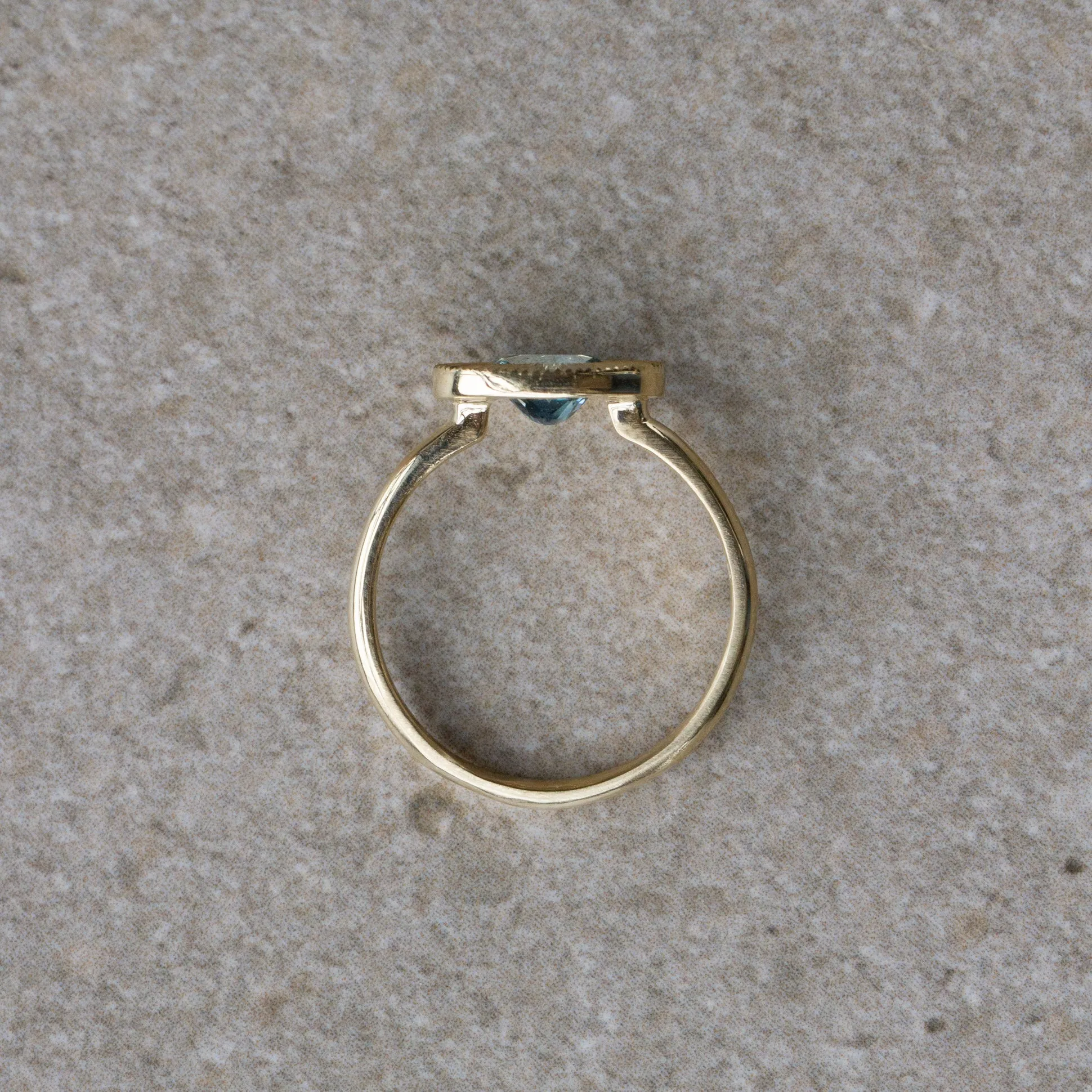 East-West Aurora Solitaire with Teal Oval Montana Sapphire